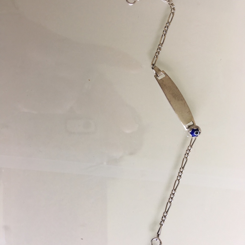 Baby silver bracelet with a protector eye for baby